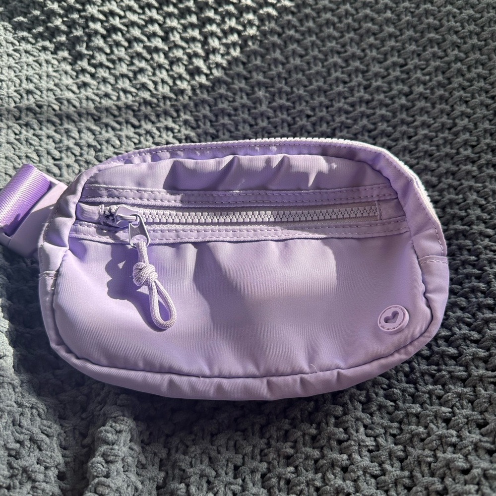 Claire's Lavender Nylon Belt Bag. 100% polyester. New. Not used.